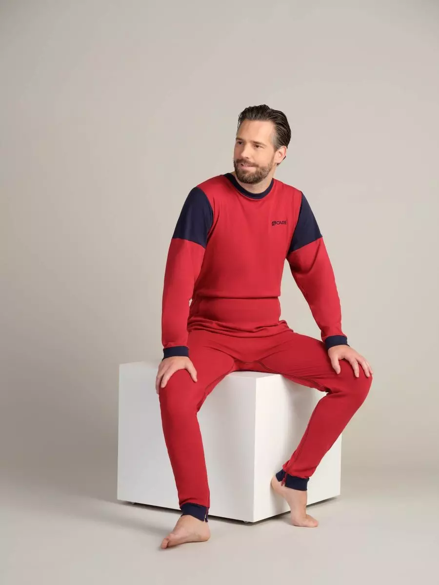 Pflegeoverall mit zwei Reißverschlüssen in der Farbe rot